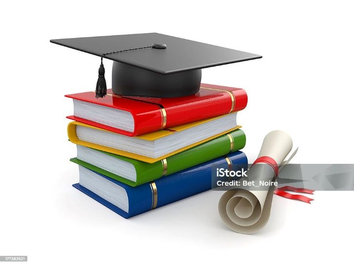 Photograph of a cap and books